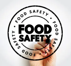 Food safety - scientific method describing handling, preparation, and storage of food in ways that prevent food-borne illness, text stamp concept
